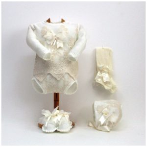 Jersey, braga, patucos, capota y leotardos